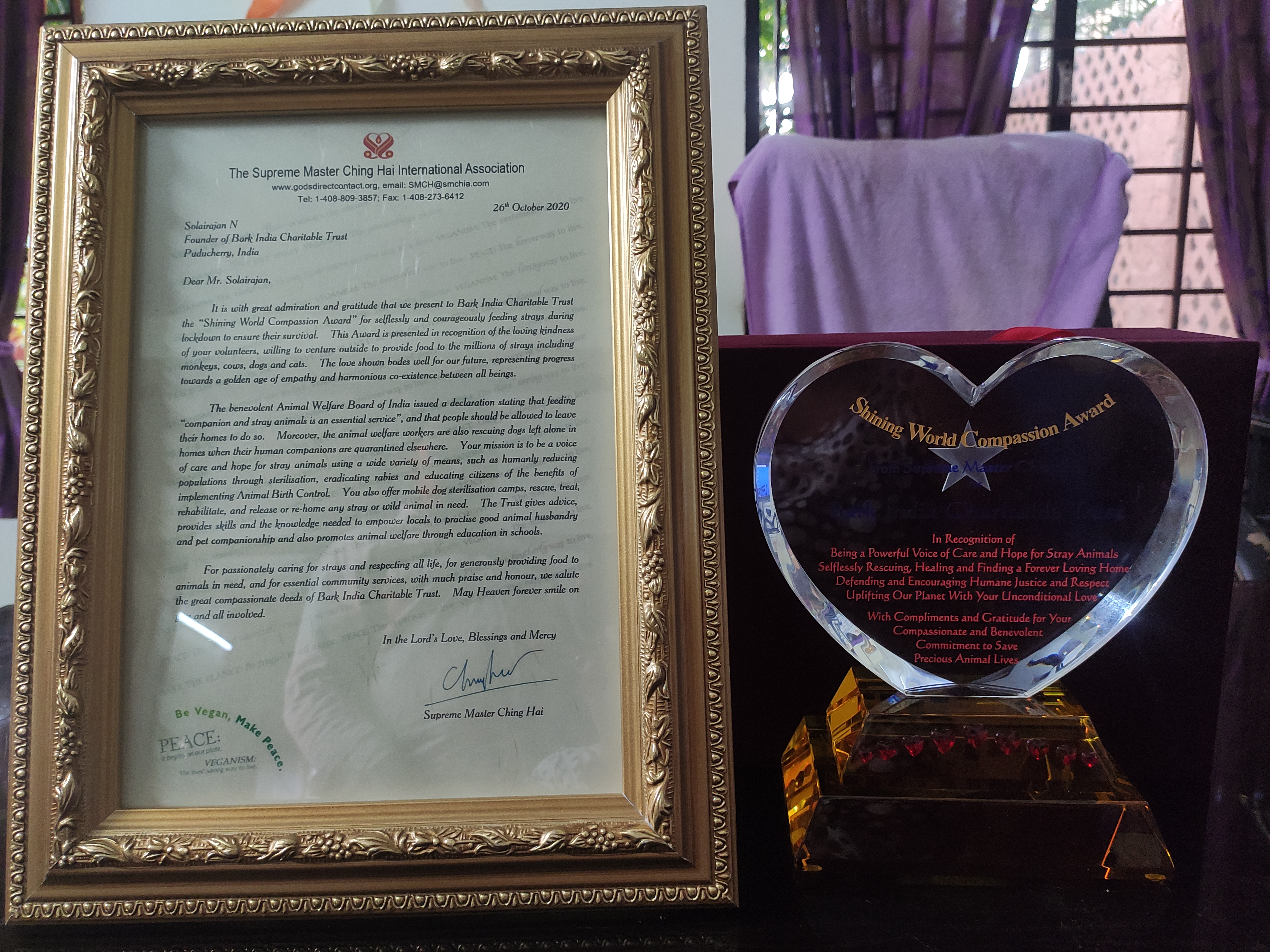 The award from Supreme Master Ching Hai Shining world Compassion Award